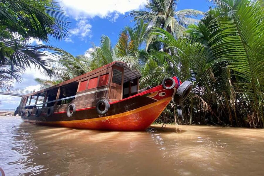 Authentic Mekong Delta: Tuk Tuk, Rowing Boat, Biking Tour - Vinh Trang Pagoda brings an early change of pace