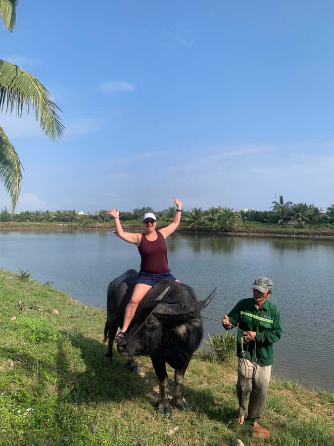BUFFALO RIDING -BASKET BOAT & BIKE TOUR-HOI AN - The nipa palm forest and round bamboo boats