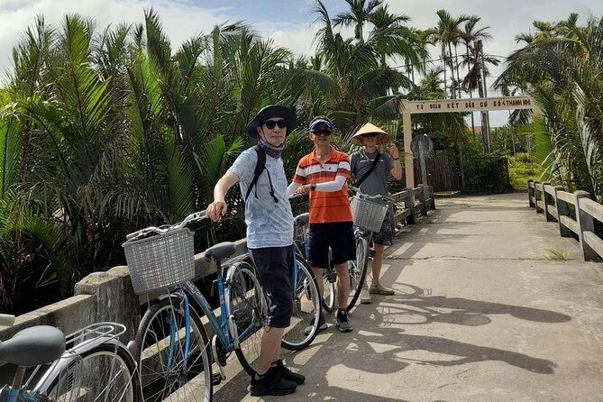 Eco Basket Boat By Bicycle and Vietnamese Set Menu - Trying the fishing activity