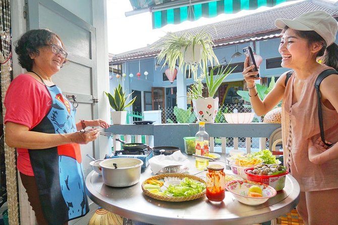 Evening Walking Food Tour, folk game and lantern boat - Back streets, Old Town sights, and a bit of history