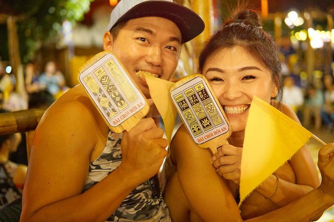 Evening Walking Food Tour, folk game and lantern boat - Vietnamese bingo and the folk-game stop