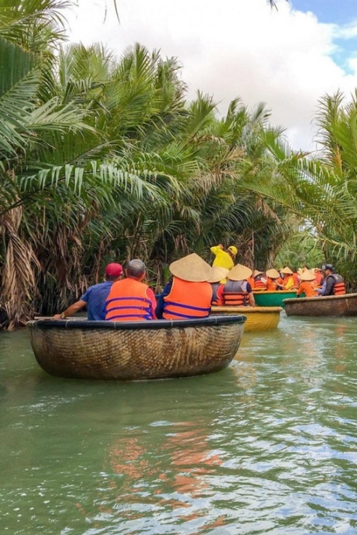 Experience Bamboo Basket Boat on Coconut village w Locals - Getting into the basket boat