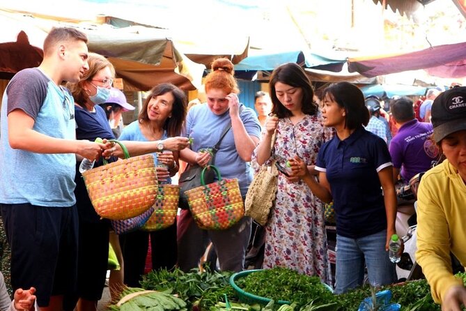 Experience Local Market and Boat Ride with Cooking Class - One hour among the stalls at Hoi An Market