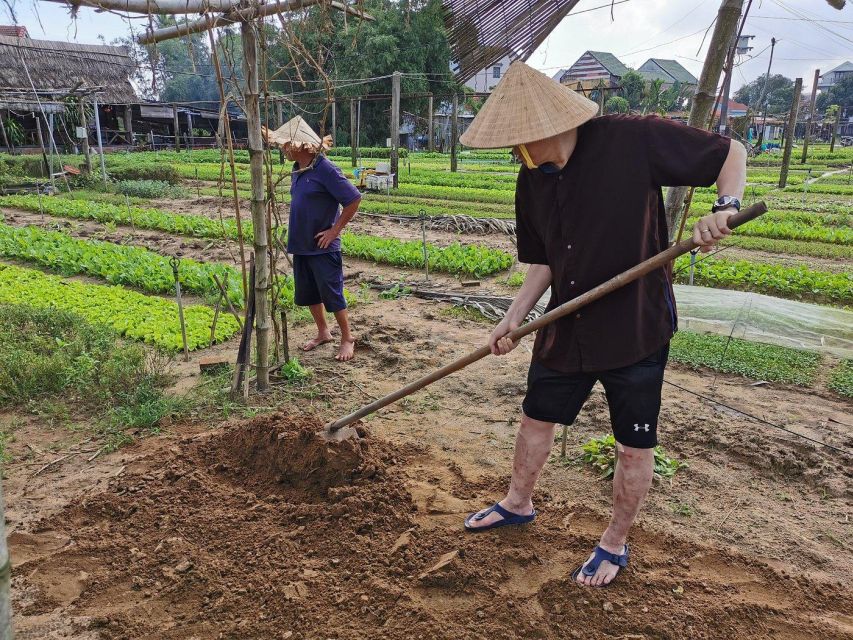 Farming with Farmers at ancient vegetable Village "Tra Que" - Riding a water buffalo and rowing a basket boat