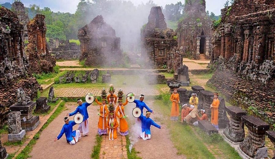 From Hoi An: Discover My Son Sanctuary & Sunset River Cruise - A banh mi with the evening views