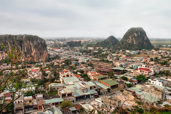 Half day Marble Mountain and Linh Ung Pagoda Tour - Climbing through Marble Mountains