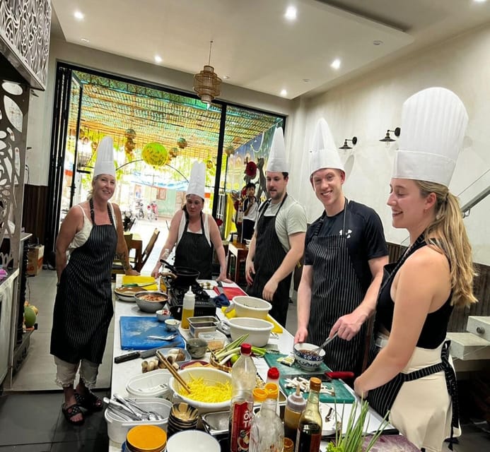 Hoi An Authentic Cooking Class with Pro Chef in Small group - Cooking the starters: sauce, mango salad, and spring rolls