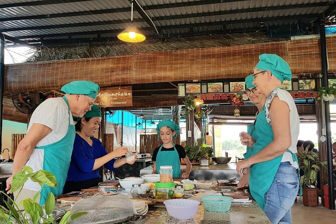 Hoi An Cooking Class With Market Tour and Bamboo Basket Boat Ride - A round bamboo boat through Bay Mau Coconut Village
