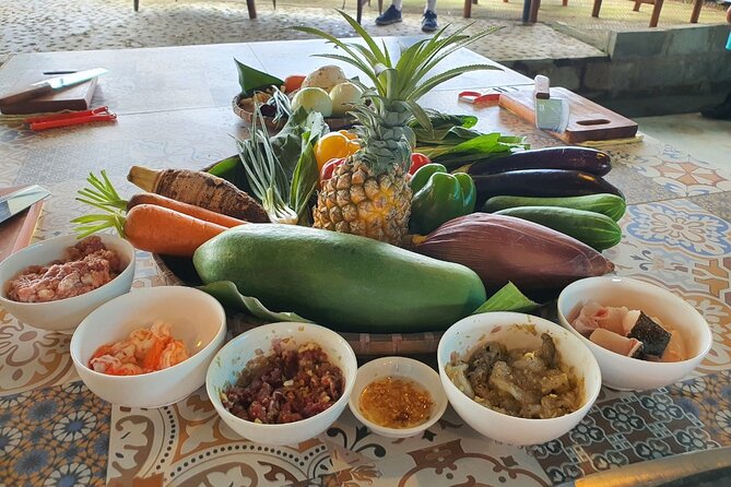 Hoi An Cooking Class With Market Tour and Bamboo Basket Boat Ride - Picking four dishes from a ten-dish menu