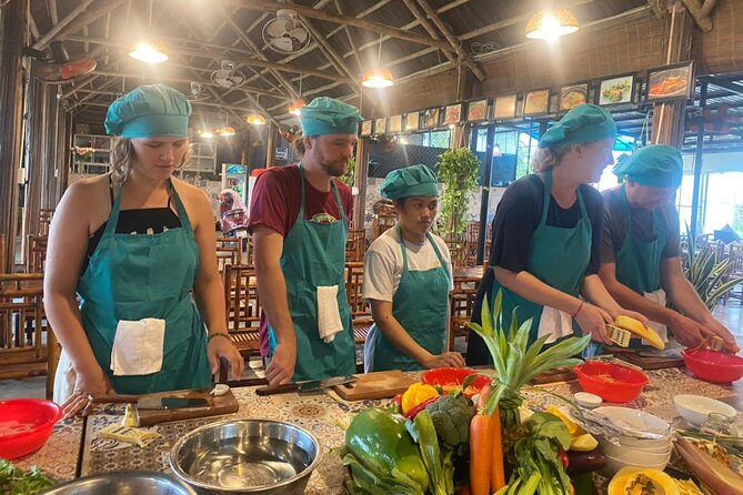 Hoi An Cooking Class With Market Tour and Bamboo Basket Boat Ride - A welcome drink and a look at the garden