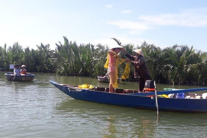 Hoi An Countryside Biking Tour(Vegetable village -basket boat - fishing village) - Entering the water coconut forest by basket boat