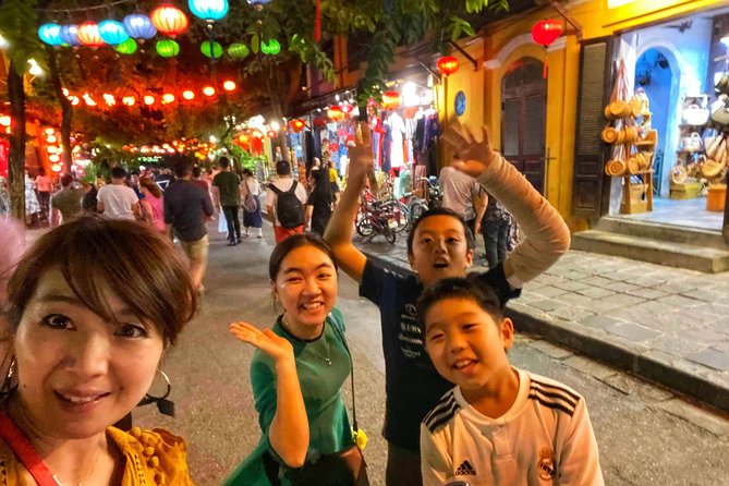 Hoi An Food Trail by Night with Boat Trip - Lanterns from a small boat on the river