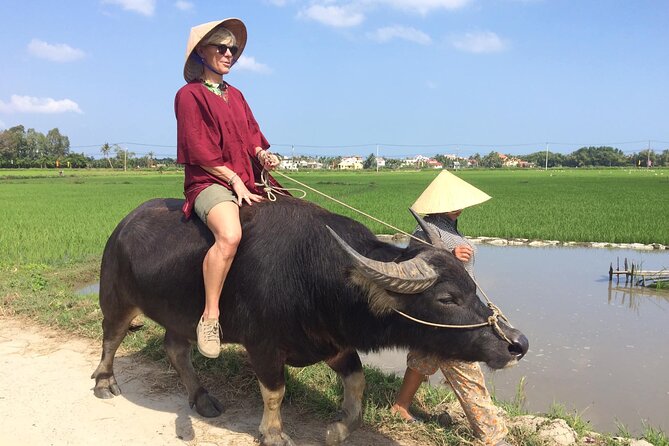 Hoi An Rice Farm Tour and Buffalo Riding with Local Home Meal - Changing into traditional farm clothing