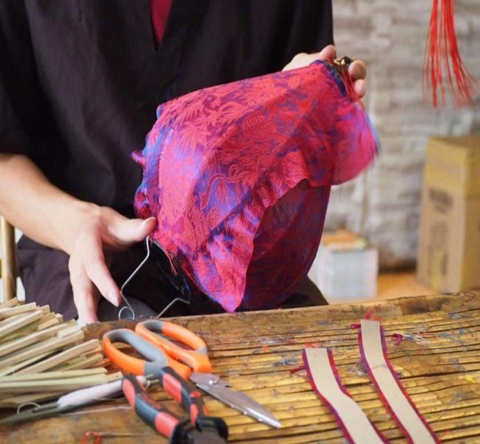 Hoi An: Silk Process, Lantern Making Workshop & Local Food - Learning to spot pure silk at the exhibition