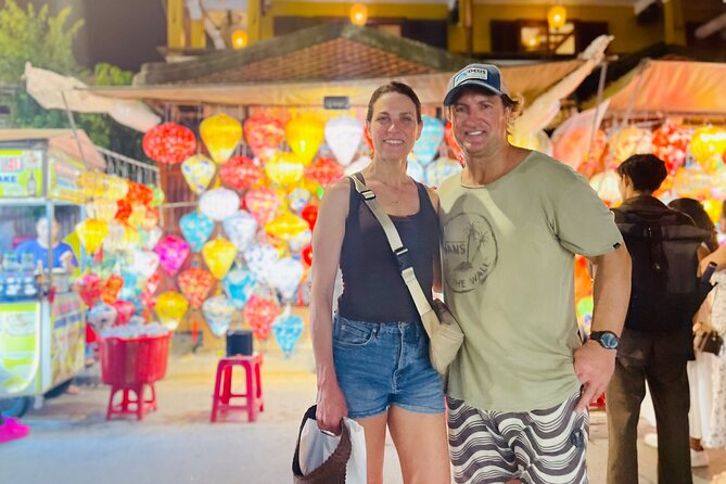 Hoi An Walking Private Tour - Lanterns, Boat Ride & Local Foods - Walking across the Japanese Covered Bridge