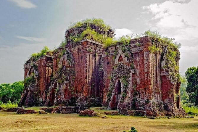 Ky Anh Tunnel & Cham Old Tower By Private Tour History of War - Chien Dan Cham Tower and its carved panels