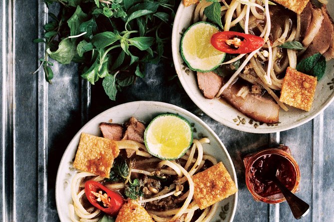 Morning food tour: 11 dishes, white rose making and foot massage - Pho and banh mi bring familiar favorites