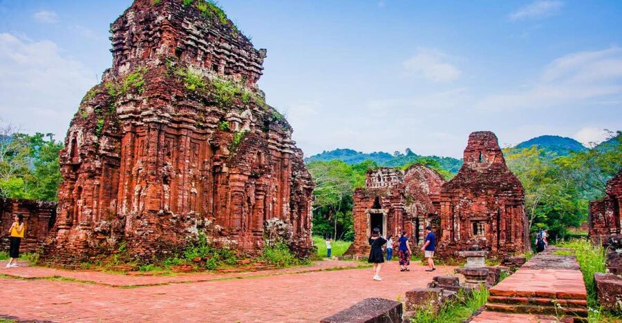 My Son Sanctuary Tour with Cham Dance & Thu Bon Boat Ride - Walking through the Cham temple groups