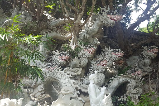 Scenic Transfer: Hoi An/Da Nang to Hue + 5 Attractions - Dragon Bridge: a ten-minute look at Da Nang