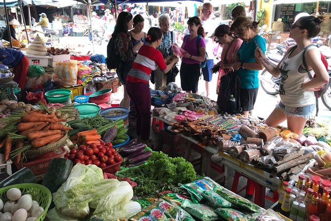 Traditional Cooking Class with Basket Boat Ride and market Tour - How good is the guide service?